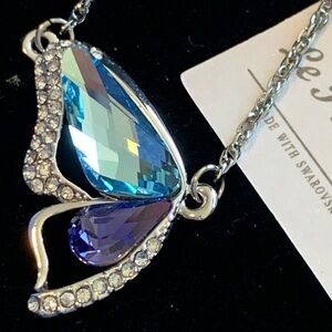 Le Premium Swarovski crystal butterfly pendant new in the box.